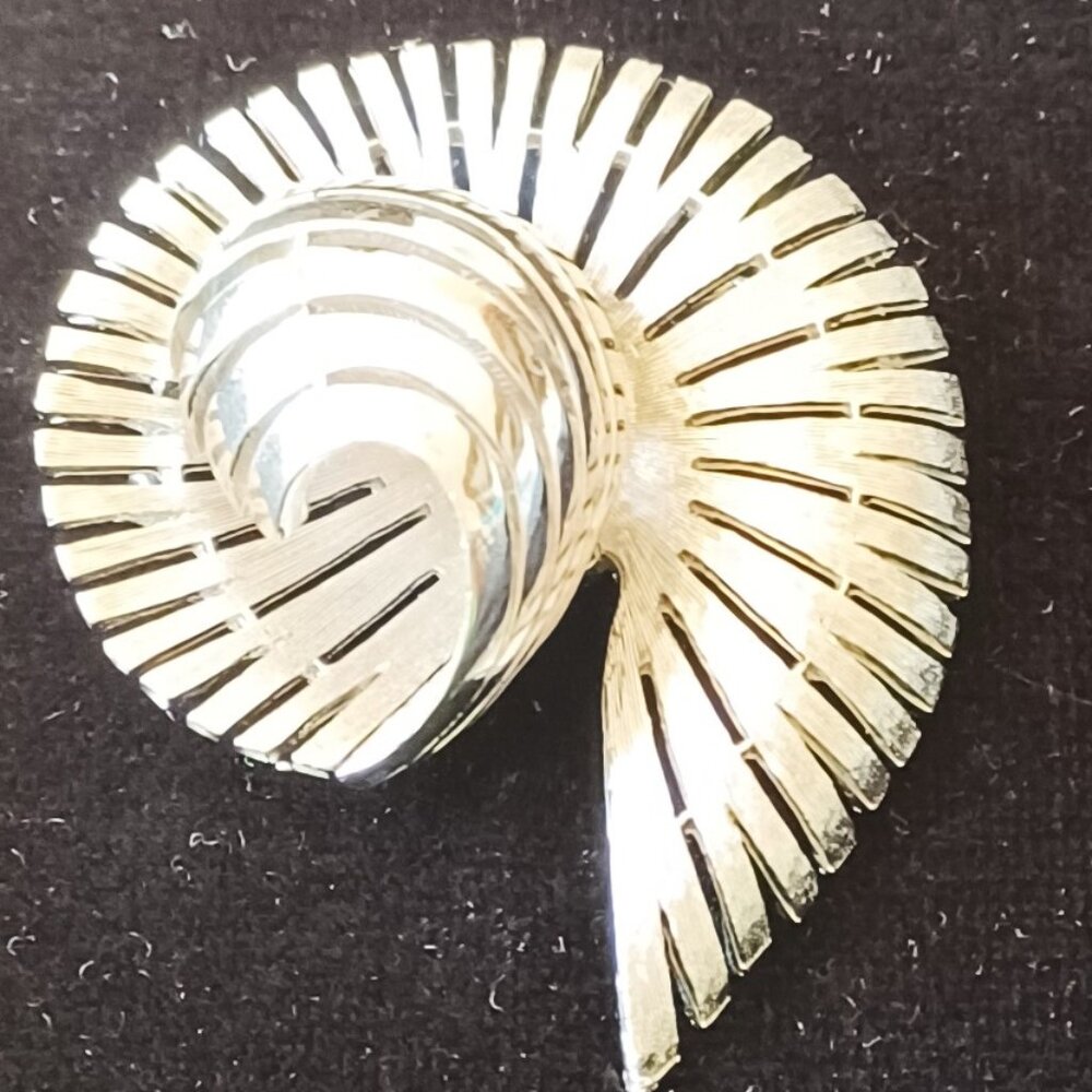 Elegant Silver and Gold Spiral Brooch